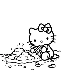 Hello Kitty building sandcastles at the beach